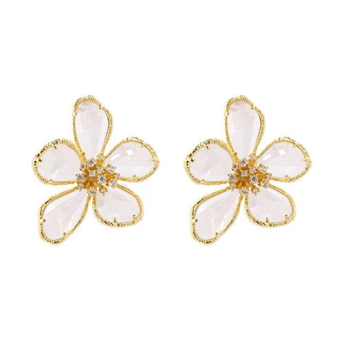 Aretes Rotativos Flor de la Riqueza con Circonitas Incrustadas