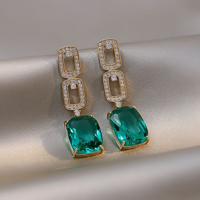 Aretes Colgantes de Diamante Verde en Oro