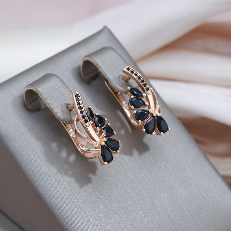 Aretes Elegantes con Cristales Negros en Oro