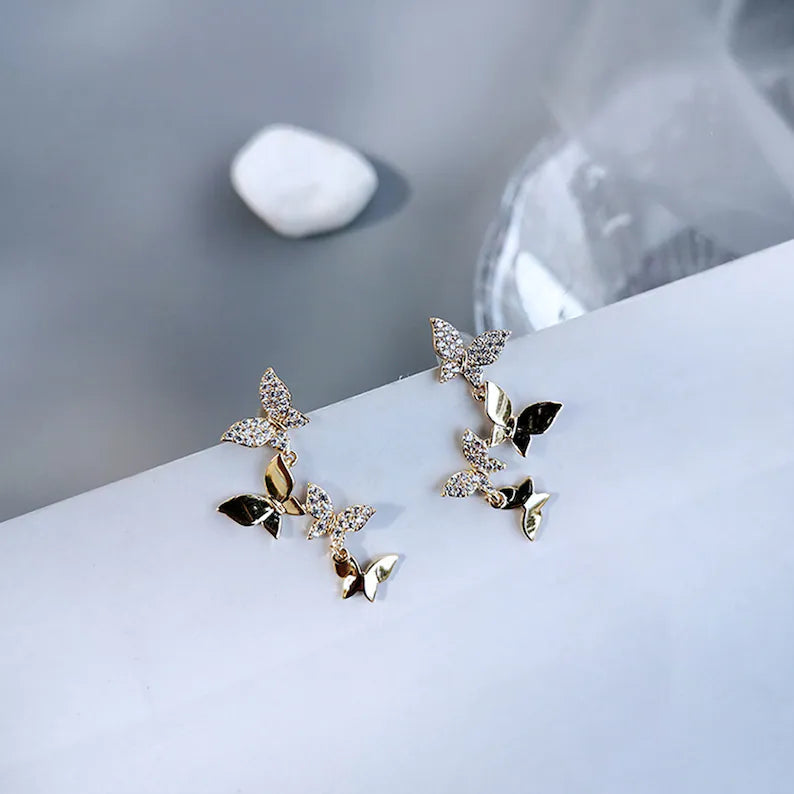 Aretes de Mariposa Social en Oro