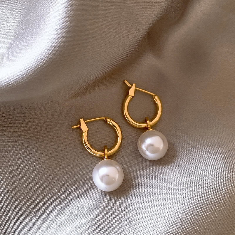 Elegantes Aretes con Cuentas de Oro